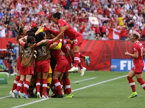 Team Canada celebrates Josee Belanger’s goal against Switzerland during FIFA Women’s World Cup action in Vancouver, B.C. on Sunday June 21, 2015. (Carmine Marinelli/Postmedia Network)