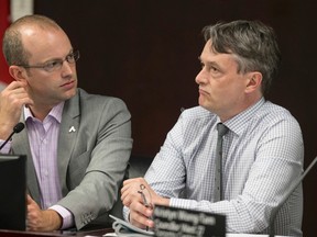 Councillors Mike Layton and Gord Perks at the community council meeting discussing speed limits Monday, June 22, 2015. (Craig Robertson/Toronto Sun)