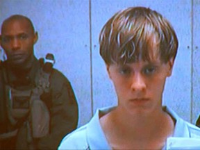 Dylann Storm Roof appears by closed-circuit television at his bond hearing in Charleston, South Carolina June 19, 2015 in a still image from video. A 21-year-old white man has been charged with nine counts of murder in connection with an attack on a historic black South Carolina church, police said on Friday, and media reports said he had hoped to incite a race war in the United States. REUTERS/POOL