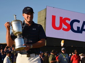 Jordan Spieth poses for with the U.S. Open Championship Trophy after winning the 2015 U.S. Open at Chambers Bay in University Place, Wash., on Sunday, June 21, 2015. (John David Mercer/USA TODAY Sports)
