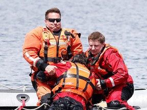 Greater Sudbury Fire Services firefighters were out on Ramsey Lake practising their boat manoeuvering and water rescue techniques in Sudbury, Ont. on Monday, June 22, 2015. Gino Donato/Sudbury Star/Postmedia Network