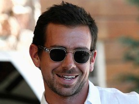 Jack Dorsey, creator of Twitter and chief operations officer of Square, smiles on arrival at the annual Allen and Co. conference in Sun Valley, Idaho July 9, 2013.  REUTERS/Rick Wilking