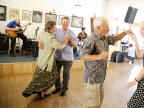 Participants dance to the sounds of The Iona Reed Trio at the Beaver Lake Sports and Cultural Club's Juhannus midsummer celebration on Sunday. Gino Donato/Sudbury Star/Postmedia Network
