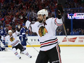 Chicago Blackhawks left wing Patrick Sharp (10) celebrates after scoring a goal against the Tampa Bay Lightning in the first period game five of the 2015 Stanley Cup Final at Amalie Arena. (Kim Klement-USA TODAY Sports)