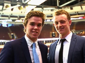 Upcoming NHL draft picks Connor McDavid (l) and Jack Eichel (r) take part in a media availability at United Center on June 8, 2015 in Chicago, Illinois.  (Bruce Bennett/Getty Images/AFP)