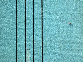 File photo of a swimming pool. (AFP Photo/DPA/RALF HIRSCHBERGER)