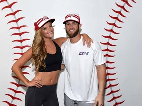 Model Nina Agdal and baseball player Bryce Harper of the Washington Nationals pose during a New Era shoot on June 8, 2015 in Fairfield, New Jersey. (Dave Kotinsky/Getty Images for New Era/AFP)