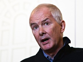 Former VANOC CEO John Furlong speaks to the media in Vancouver, Sept. 27, 2012. (ANDY CLARK/Reuters)