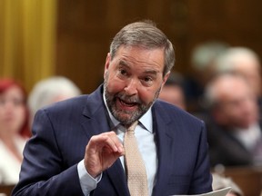 During a visit to a Quebec City microbrewery, NDP leader Tom Mulcair said that independence is "a vision that risks really hurting the middle class." THE CANADIAN PRESS/Fred Chartrand