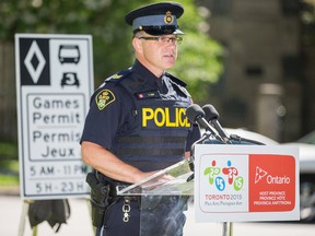OPP Sgt. Peter Leon addresses the media about the Pan Am Games Queen's Park Crescent in Toronto Tuesday June 23, 2015. (Ernest Doroszuk/Toronto Sun)