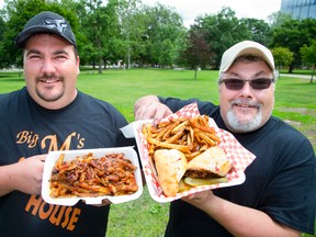 Brad McLeod and his father Terry of the Big M Smoke House will be offering such delicacies as pulled-pork poutine and smoked brisket sandwiches during the International Food Festival in Victoria Park this weekend. Festival organizer Doug Hillier says,  unlike London?s other outdoor festivals, authentic ethnic food is the star this weekend. (DEREK RUTTAN, The London Free Press)