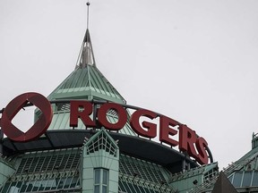 A Rogers sign is seen at its headquarters in Toronto on April 22, 2014.    REUTERS/Mark Blinch