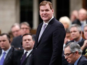 John Baird announces his resignation in the House of Commons on Parliament Hill in Ottawa in this Feb. 3, 2015 file photo. REUTERS/Chris Wattie