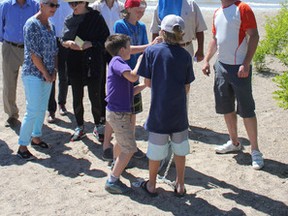 Last Friday two blue flags were raised in Bayfield at the main beach and marina. A blue flag designation is an eco-certification administered by Environmental Defence in Canada. Beaches and marinas must meet a variety of criteria to be awarded a blue flag including, safety, water quality, education and management. (Laura Broadley/Clinton News Record)