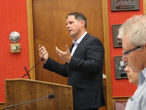 BRUCE BELL/THE INTELLIGENCER
Andrew Grunda of Watson and Associates presents a report on amending Prince Edward County’s development charges bylaw to council during a public meeting at Shire Hall on Tuesday evening.