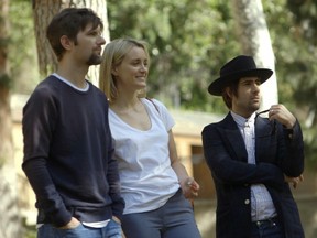 From left: Adam Scott, Taylor Schilling, and Jason Schwartzman in a scene from The Overnight. (Handout photo)