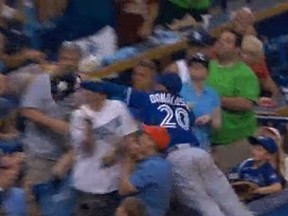 Josh Donaldson went four rows into the stands to make a diving catch.