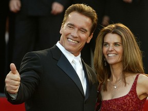 Arnold Schwarzenegger with Maria Shriver (Reuters files)