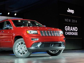 Fiat Chrysler announced the recall of 164,000 2014 and 2015 Jeep Cherokee SUVs worldwide to fix a water leak issue that could cause an electrical fire. REUTERS/James Fassinger/Files