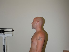Paul McClung, showing a swastika tattoo on his shoulder. (Supplied photo)
