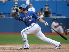 Devon Travis is expected to return to the Blue Jays lineup for the team's weekend series against the visiting Texas Rangers. (AFP/PHOTO)