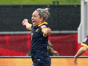 MONCTON, NB - JUNE 21: Kyah Simon #17 of Australia celebrates her goal in the second half against Brazil during the FIFA Women's World Cup 2015 round of 16 match between Brazil and Australia at Moncton Stadium on June 21, 2015 in Moncton, Canada.  Elsa/Getty Images/AFP