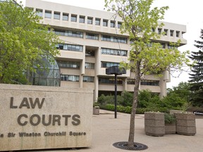 The Edmonton Law Courts, housing provincial courts, family courts, the Court of Appeal and Court of Queen's Bench, is seen in downtown Edmonton, Alta., Monday, June 9, 2014.