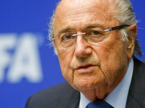 FIFA President Sepp Blatter addresses a news conference after a meeting of the FIFA executive committee in Zurich, in this March 21, 2014 file photo. (Reuters/Arnd Wiegmann/Files)