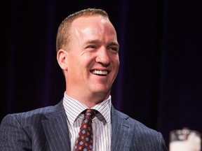 Peyton Manning attends the Super Bowl Breakfast where he received the Bart Starr award at JW Marriott Desert Ridge Resort & Spa on January 30, 2015 in Phoenix, Arizona. Jerritt Clark/Getty Images for Super Service Challenge/AFP