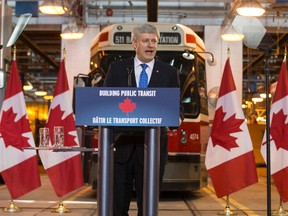 Prime Minister Stephen Harper announces new Public Transit Fund that  will contribute up to $2.6 billion for SmartTrack once a formal application has been received and approved in Toronto on Thursday, June 18, 2015. (Craig Robertson/Postmedia Network)