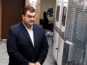 Former MP Dean Del Mastro is led to an OPP prisoner transport vehicle at the Simcoe St. courthouse early in the afternoon of Thursday, June 25, 2014. CLIFFORD SKARSTEDT/Peterborough Examiner/Postmedia Network