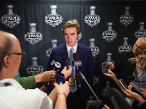 Upcoming NHL draft pick Connor McDavid speaks with the media during media availability at United Center on June 8, 2015 in Chicago, Illinois.   Bruce Bennett/Getty Images/AFP