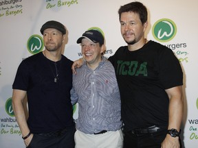Wahlburgers Coney Island VIP Preview Party with Donnie Wahlberg, Paul Wahlberg, Mark Wahlberg. (WENN.com)