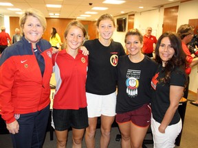 U.S. Olympic and World Cup keeper Mary Harvey and young athletes Rebecca Bartosh, Tori Powell and Monica Bartosh, along with former Canadian national soccer team member Helen Stoumbos gathered for a media reception, part of a Sports Envoy Program, at Tom Davies Square in Sudbury, Ont. on Thursday June 25, 2015. Ben Leeson/Sudbury Star/Postmedia Network