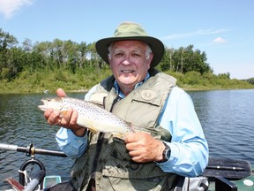 Emmerson Dober with a Muir Lake brown trout.