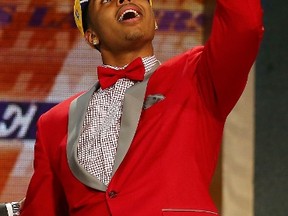 D’Angelo Russell celebrates after being drafted second by the Lakers Thursday night. (afp)