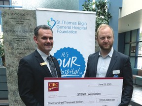 CIBC district vice-president David Goulart, left, presents a $100,000 donation to St. Thomas Elgin General Hospital Foundation executive director Paul Jenkins at an official announcement Thursday. The donation will support the hospital's Great Expansion project -- the largest infrastructure investment since STEGH was built six decades ago.