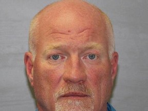 This photo obtained from the New York State Police June 25, 2015 shows Gene Palmer. A second prison worker was arrested and charged June 24, 2015 over the escape of two convicted killers weeks ago from a maximum-security New York jail, with police warning they are likely armed and dangerous. Richard Matt, 49, and David Sweat, 35, used power tools to cut their way out of their cells at the Clinton Correctional Facility before dawn on June 6 in a spectacular prison break likened to a Hollywood movie. The escape sparked a huge manhunt with more than 1,000 agents backed by sniffer dogs and helicopters deployed to find the men, who have reportedly been spotted in several locations in recent days in upstate New York. Corrections officer Gene Palmer, 57, was charged with promoting prison contraband, two counts of tampering with evidence and one count of official misconduct, Major Charles Guess of New York State Police said in a statement. Palmer allegedly helped smuggle tools and other banned items hidden in hamburger meat, said Clinton County District Attorney Andrew Wylie, according to ABC News. AFP PHOTO/NEW YORK STATE POLICE