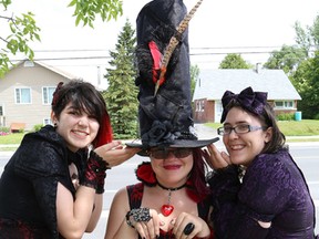 Graduating Lo-Ellen Park Secondary School students Alison Smith, left, Alexandra Wong and Patience Yandeau got dressed up for the last day of classes at the school in Sudbury, Ont. on Thursday June 25, 2015. John Lappa/Sudbury Star/Postmedia Network