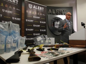 Alberta Law Enforcement Response Teams' (ALERT)  Insp. Darcy Strang speaks to media regarding the largest seizure of GHB in the province at ALERT headquarters on Friday, June 26, 2015 in Edmonton, AB. Trevor Robb/Edmonton Sun