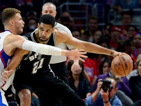Los Angeles Clippers forward Blake Griffin guards San Antonio Spurs forward Tim Duncan during Game 7 of the first round of the NBA Playoffs at Staples Center on May 2, 2015. (Jayne Kamin-Oncea/USA TODAY Sports)