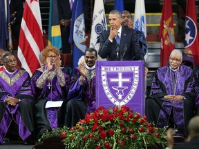 U.S. President Barack Obama delivers the eulogy for South Carolina state senator and Rev. Clementa Pinckney during Pinckney's funeral service June 26, 2015 in Charleston, South Carolina. Suspected shooter Dylann Roof, 21, is accused of killing nine people on June 17th during a prayer meeting in the church, which is one of the nation's oldest black churches in Charleston.  Joe Raedle/Getty Images/AFP