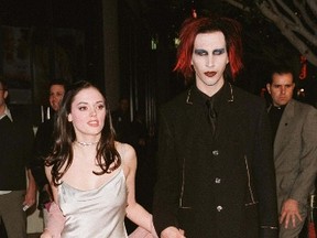 Actress Rose McGowan and then-boyfriend, singer Marilyn Manson, arrive for the premiere of their comedy film "Jawbreaker" iin 1999. (Rose Prouser/REUTERS)