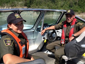 Fish and Wildlife Officers Andy Nestorovich and Kim Berscheid patrol the North Saskatchewan River in Parkland County on June 24,2015. Pamela Roth/Edmonton Sun/Postmedia Network