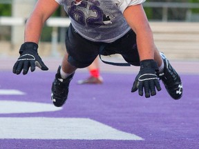 London Jr. Mustangs offensive guard Matthew Bettencourt performs a drill during practice at TD stadium. The Jr. Mustangs play host to the Brampton Bulldogs Saturday at 8:15 p.m. (MIKE HENSEN, The London Free Press)