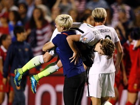 United States midfielder Megan Rapinoe celebrates with defender Meghan Klingenberg (22) after defeating China in the quarterfinals of the FIFA 2015 Women's World Cup at Lansdowne Stadium. United States won 1-0.
Michael Chow/USA TODAY