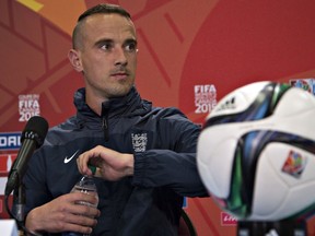 England coach Mark Sampson attends a news conference prior to a training at the 2015 FIFA Women's World Cup in Vancouver on June 26, 2015. (AFP/Andy Clark)