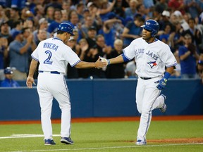 Edwin Encarnacion hits his 2nd homer of the night as the Toronto Blue beat the Texas Rangers 12-2 at the Rogers Centre in Toronto, Ont. on Friday June 26, 2015. (Stan Behal/Toronto Sun/Postmedia Network)