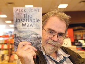 Author Mick Lowe with his latest novel, The Insatiable Maw, at Chapters in Sudbury, Ont. on Friday June 26, 2015. The book is the second novel in his Nickel Range trilogy. Lowe is holding a public reading at the Pioneer Manor Long Term Care Facility, May 2, 1:30 p.m. to 3 p.m. John Lappa/Sudbury Star/Postmedia Network