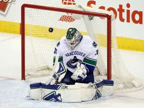 The Canucks sent goalie Eddie Lack to the Hurricanes in a trade involving two draft picks going Vancouver's way. (Bruce Fedyck/USA TODAY Sports)
